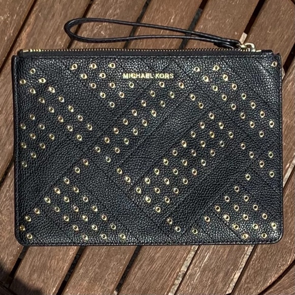 Michael Kors Handbags - Michael Kors Small Leather Jet Set Travel Zip Grommet Clutch